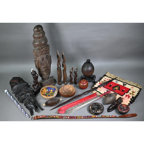 1273 - Quantity of tribal artefacts of mixed ethnography, including headhunters sword, bead work, carved wo... 