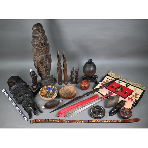 1273 - Quantity of tribal artefacts of mixed ethnography, including headhunters sword, bead work, carved wo... 