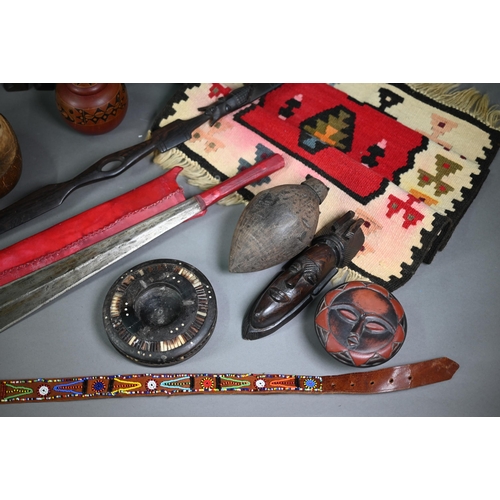 1273 - Quantity of tribal artefacts of mixed ethnography, including headhunters sword, bead work, carved wo... 