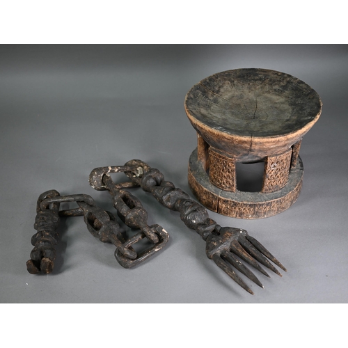 1274 - African carved wood stool, to/w a carved 'marriage' chain with fork and figure, 128 cm (2)