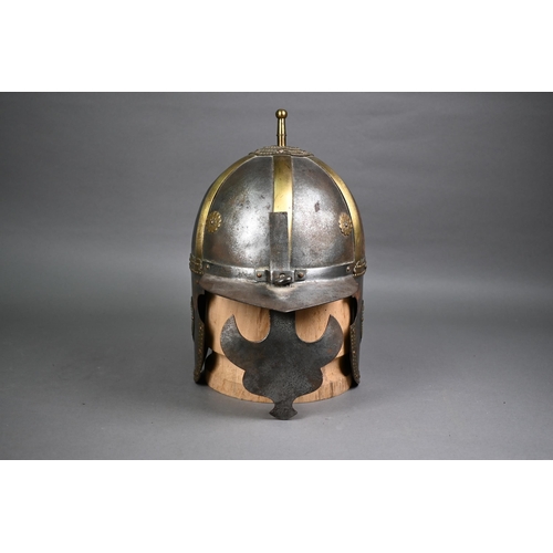 1296 - A 19th century Polish Hussars helmet, of rivetted and screwed form, on wood mount for display