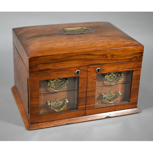 1309 - A late Victorian walnut jewellery box, the domed hinge lid enclosing a fitted interior, over a pair ... 