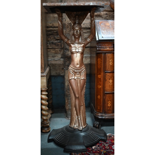 1314 - A 1930s cast iron Egyptian style figure supporting a marble shelf, approx. 109 cm h