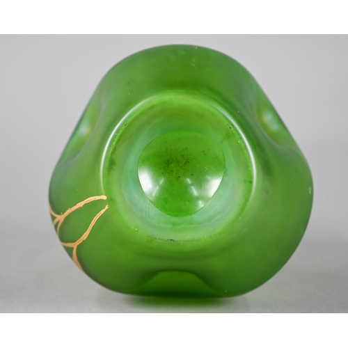 530A - Loetz-style Art Nouveau irridescent green glass vase of organic form, hand-gilded with stylised flow... 