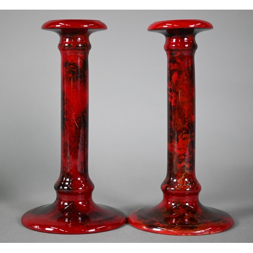 534 - Pair of Crown Ducal Spectria Flambé candlesticks, 22 cm to/w a Crown Ducal 'Rana' floral-prin... 