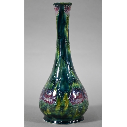 537 - Art Nouveau George Cartlidge Morris Ware slender vase with bulbous base, decorated with flowers, sig... 