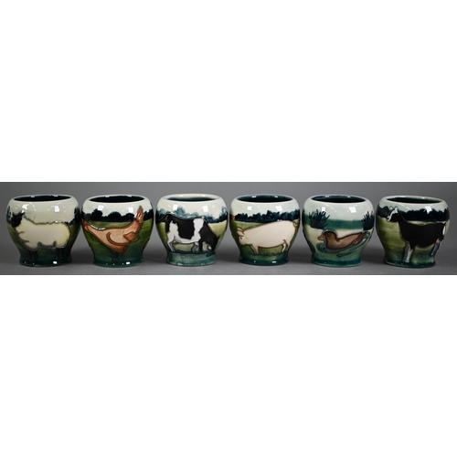 540 - Boxed set of six Moorcroft 'Farmyard' egg cups, designed by Angela Davenport (1998)