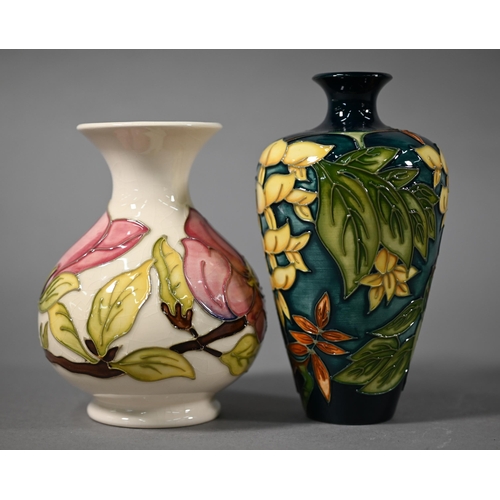 542 - Boxed Moorcroft 'Wisteria' vase designed by Philip Gibson (1998), 16 cm high to/w a 'Magnolia' vase,... 