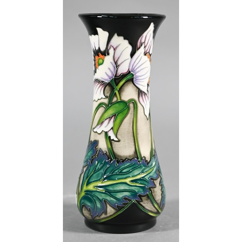 547 - Moorcroft 'Oriental Poppy' baluster vase designed by Philip Gibson, 21 cm (boxed)