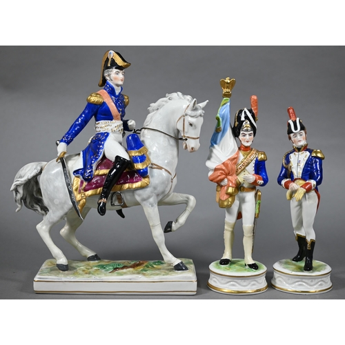 567 - Three Dresden Napoleonic soldier figures - one mounted, 25-20 cm 