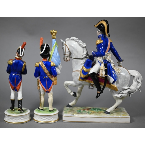 567 - Three Dresden Napoleonic soldier figures - one mounted, 25-20 cm 