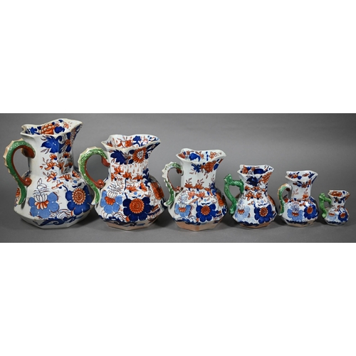 580 - Graduated matched set of six 19th century Masons Ironstone jugs, 22-8 cm to/w three other 8cm jugs a... 