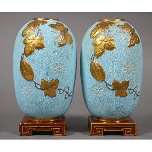 582 - Pair of Victorian Minton china vases or night-lights in the Aesthetic manner, modelled as pale blue ... 