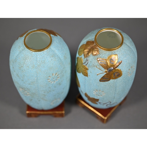 582 - Pair of Victorian Minton china vases or night-lights in the Aesthetic manner, modelled as pale blue ... 