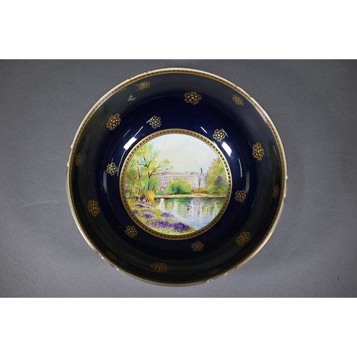 584 - Shelley china bowl, painted with a view of Buckingham Palace from St James's Park, within blue and g... 