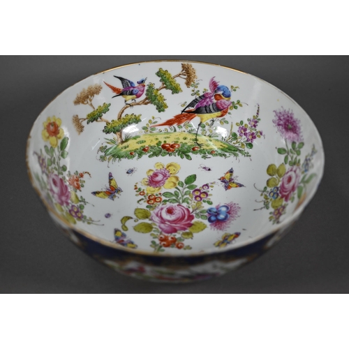 585 - A 19th century Continental porcelain punch-bowl in the manner of the 18th century Worcester factory,... 