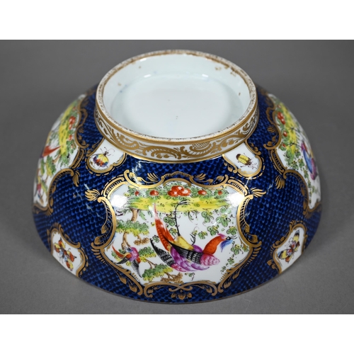 585 - A 19th century Continental porcelain punch-bowl in the manner of the 18th century Worcester factory,... 