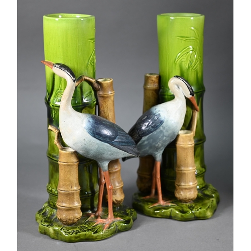 592 - Bretby majolica jardinière with moulded leaf design, the base mounted with two cranes, 40 cm high, n... 