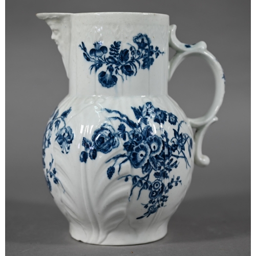 593 - First Period Worcester cabbage-leaf jug with Bacchus-mask spout and scroll handle, printed with blue... 