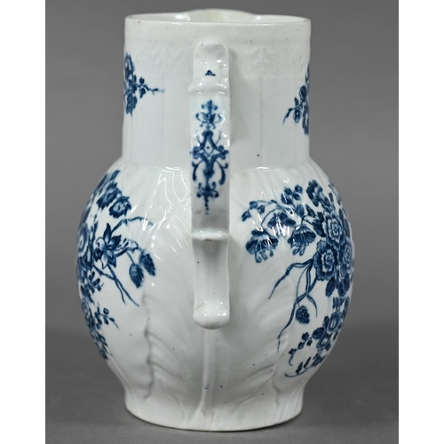 593 - First Period Worcester cabbage-leaf jug with Bacchus-mask spout and scroll handle, printed with blue... 