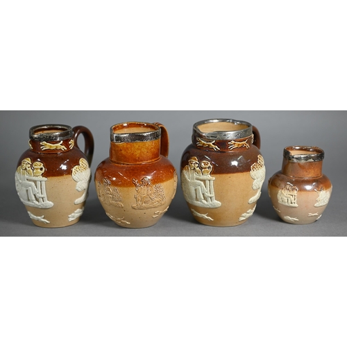 595 - Matched set of eight Royal Doulton stoneware jugs with silver rims, 19-4.5 cm, one commemorating Sha... 