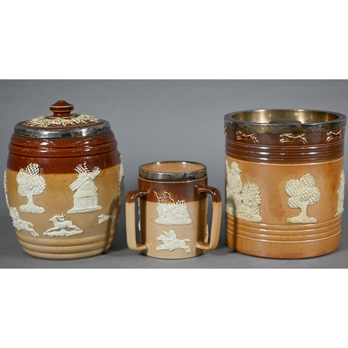 596 - Two silver-rimmed Doulton stoneware cylindrical mugs and two similar beakers, to/w a small loving cu... 