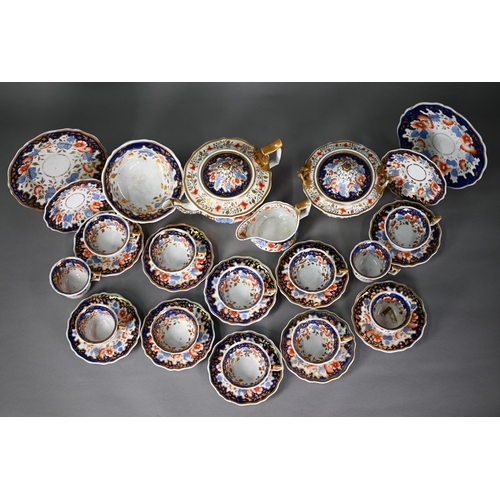 600 - A Regency china part tea service, painted and gilded with floral and foliate decoration, comprising ... 