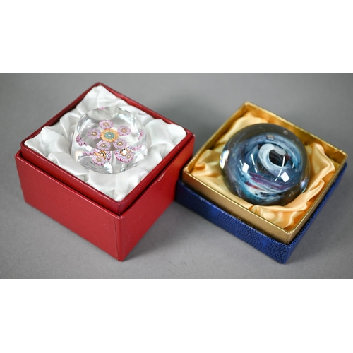 628 - Facetted glass pentagonal paperweight with floral canes and star-cut base, 6 cm diam to/w a Cornish ... 