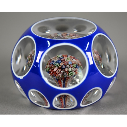 630 - Baccarat glass blue flash and facetted paperweight with small millefiori inner display and star-cut ... 