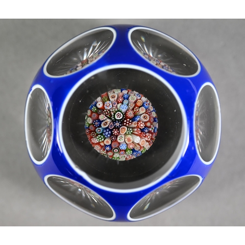 630 - Baccarat glass blue flash and facetted paperweight with small millefiori inner display and star-cut ... 