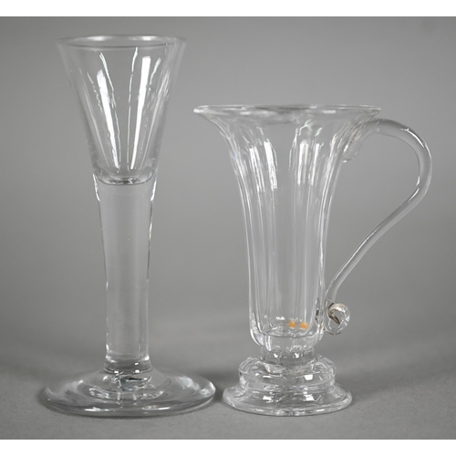 635 - A Georgian fluted jelly glass with flared rim and scroll handle, on ogee goot, 11.5 cm to/w a cordia... 