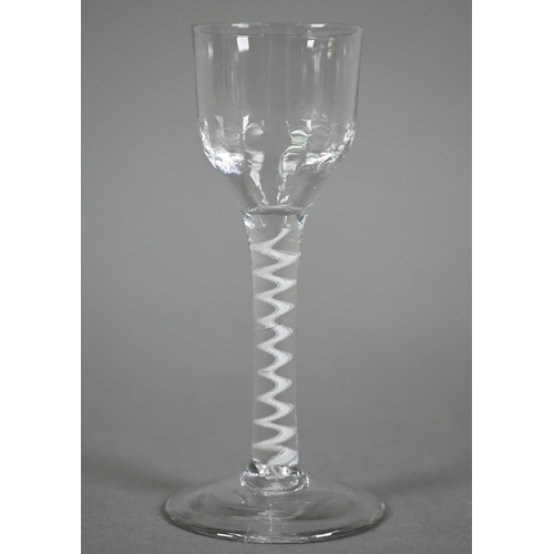 642 - A Georgian cordial glass with fluted bowl, on opaque twist stem and domed foot, 14 cm