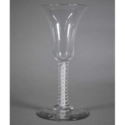 646 - A Georgian drinking glass with trumpet-shaped bowl on double opaque twist stem, 17 cm