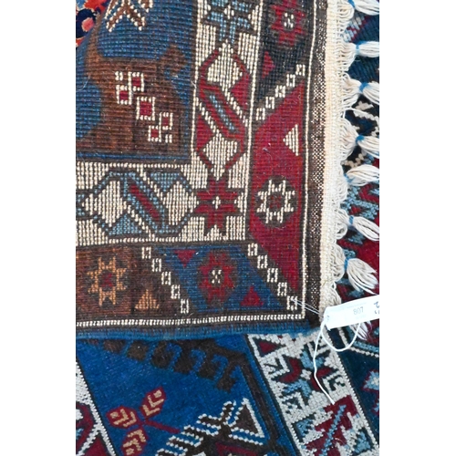 807 - A contemporary Turkish rug, the blue ground with diamond pole design, mid 20th century, 230 cm x 152... 