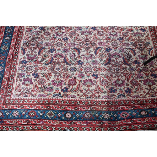 821 - An antique Persian Bakhshayesh carpet, the geometric all-over repeat design on camel ground, 530 cm ... 