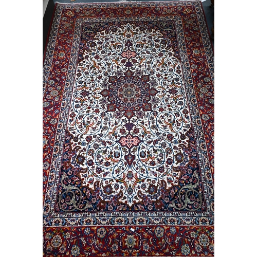 826 - A fine contemporary Persian Tabriz rug, the cream ground with floral design medallion rambling flora... 