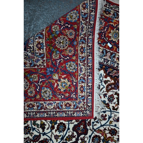 826 - A fine contemporary Persian Tabriz rug, the cream ground with floral design medallion rambling flora... 