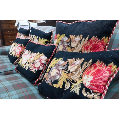 831 - Six black ground needlepoint floral design cushions, approx. 45 cm x 35 cm (6)