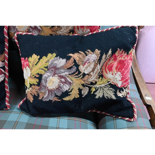 831 - Six black ground needlepoint floral design cushions, approx. 45 cm x 35 cm (6)