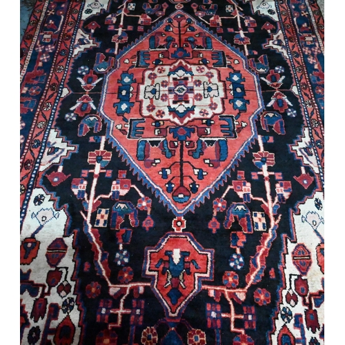 838 - A North West Persian Nahawand carpet, 295 cm x 152 cm