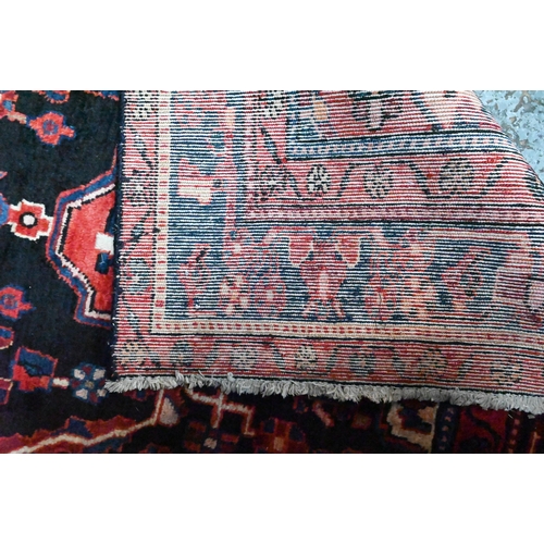 838 - A North West Persian Nahawand carpet, 295 cm x 152 cm