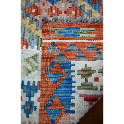 840 - An Anatolian kilim, multi-coloured diamond design, 178 cm x 128 m