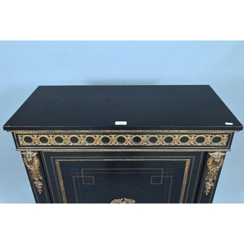 850 - Druce & Co., London, a Victorian gilt-metal mounted ebonised pier cabinet, the door centred with... 