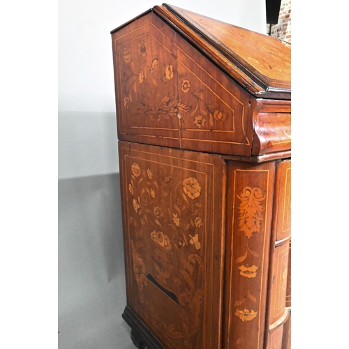 858 - An 18th/19th century Dutch floral marquetry walnut bureau, the hinged slope enclosing a part fitted ... 