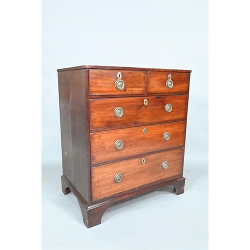 871 - A Georgian mahogany diminutive chest of two short over three long graduated drawers, raised on shape... 