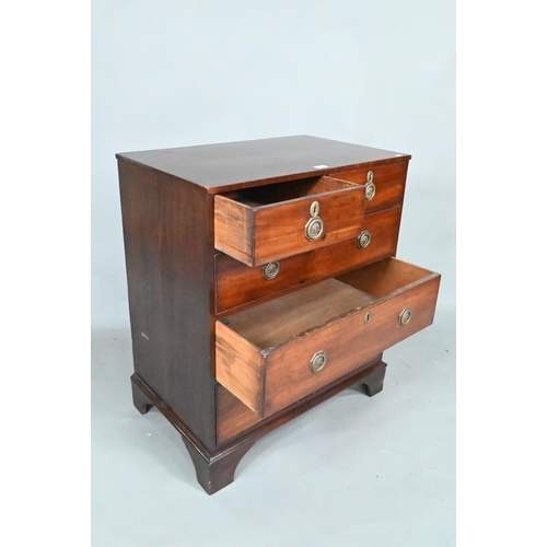 871 - A Georgian mahogany diminutive chest of two short over three long graduated drawers, raised on shape... 