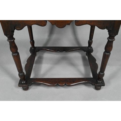 873 - A 17th century style provincial oak side table, with single frieze drawer, raised on turned legs uni... 