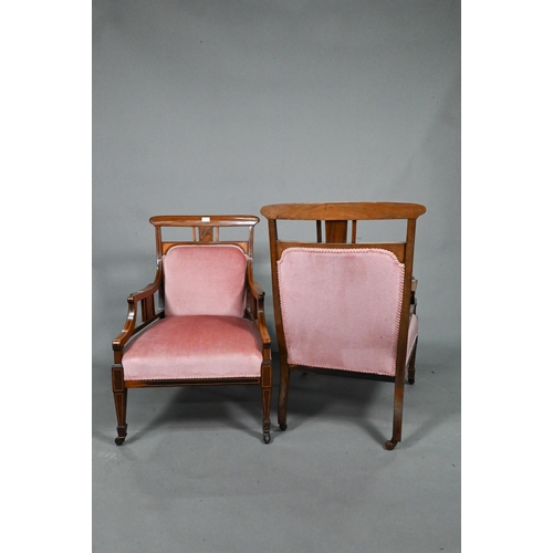 876 - Two companion Edwardian Sheraton Revival style satinwood inlaid rosewood salon armchairs, with confo... 