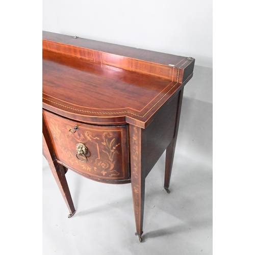 886 - A George III boxwood inlaid mahogany Sheraton design sideboard, of bow-breakfront form with a raised... 