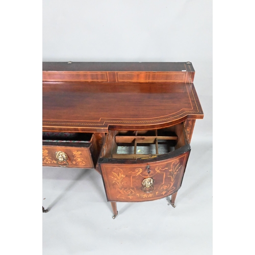 886 - A George III boxwood inlaid mahogany Sheraton design sideboard, of bow-breakfront form with a raised... 